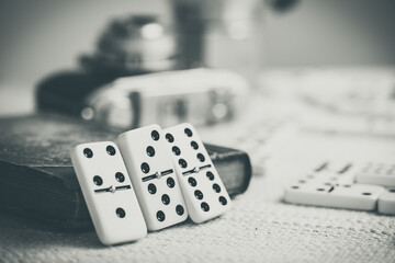 Playing Dominoes on the table