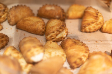 Sweet pastries. Confectionery on store counter.