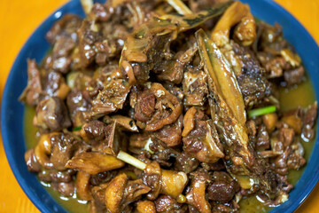 A plate of delicious Chinese home cooking, beer braised duck