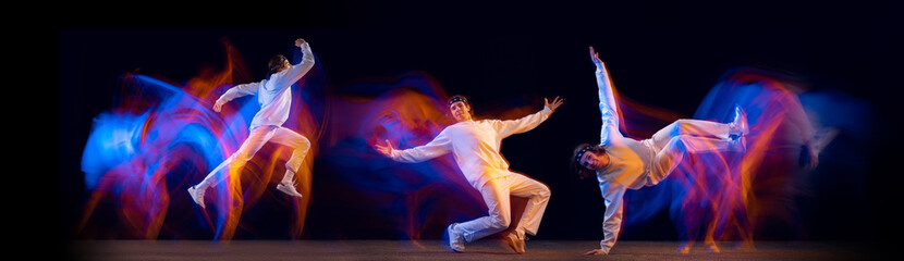 Composite image with stylish man dancing hip-hop, breakdance in white clothes on dark background...