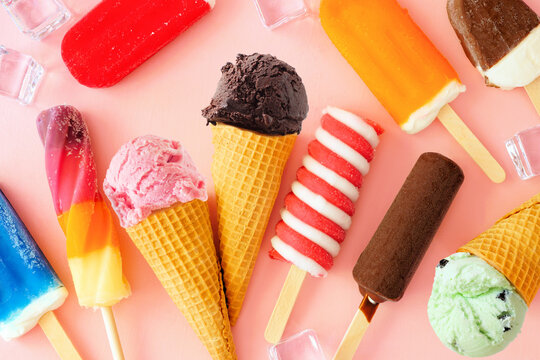 Assortment Of Chocolate And Colorful Summer Frozen Desserts. Top Down View Table Scene On A Pink Background.