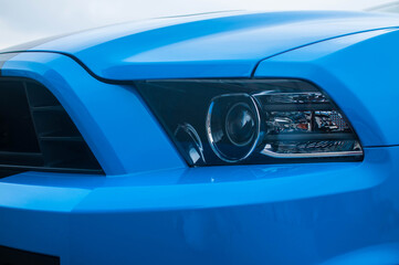 Obraz na płótnie Canvas beautiful racing car blue ford mustang shelby details