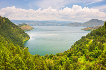 Lake Toba and Samosir Island view from above Sumatra Indonesia. Huge volcanic caldera covered by...