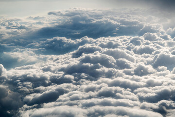 Aerial view on fluffy clouds only