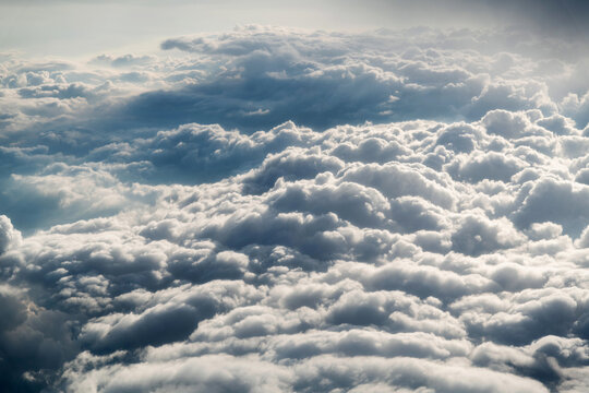 Aerial view on fluffy clouds only © xy