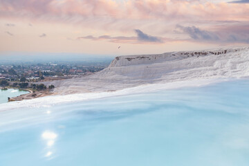 Natural travertine pools pool blue water and terraces in Pamukkale Turkey