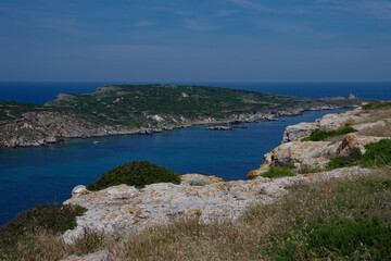 View from the island of San Nicola towards the island of Capraia and its abandoned lighthouse. Tremiti islands, Adriatic sea, Puglia, Italy