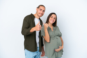 Young caucasian couple isolated on white background pregnant and with thumb up