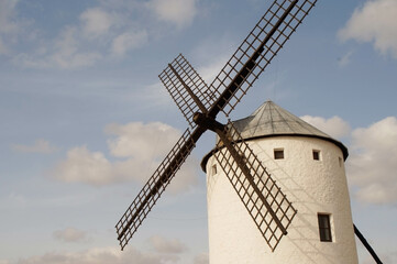Windmills type "tower" Campo de Criptana (Ciudad Real), with windows and whitewashed with lime. They have three floors: the upper floor with the millstones and the lower floors for storage and packagi