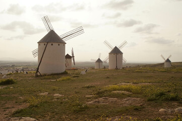 Windmills type "tower" Campo de Criptana (Ciudad Real), with windows and whitewashed with lime. They have three floors: the upper floor with the millstones and the lower floors for storage and packagi