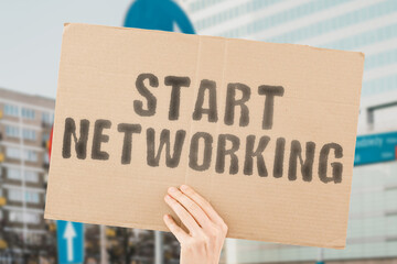 The phrase " Start networking " on a banner in men's hands with blurred background. Man. Connect. Global. Media. Tech. Contact. Corporate. Discussion. Employee. Executive. Friend. Future. Customer