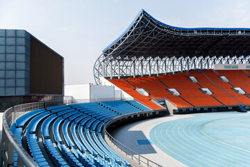 Big stadium with blue track