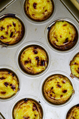 Egg tart, traditional Portuguese dessert, pastel de nata. Freshly baked.