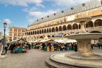 Piazza delle Erbe with the historic Padua market and the splendid Palazzo della Regione in the...