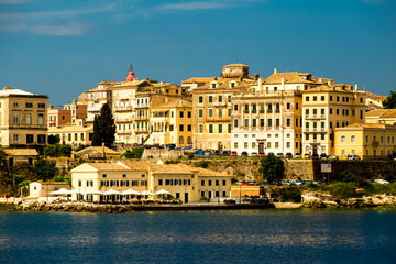 Fototapeta na wymiar corfu city port and houses view from ship greece