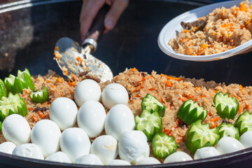 Pilaf cooked on the street.