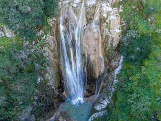 Aerial view of beautiful waterfall in nymfes corfu island greece