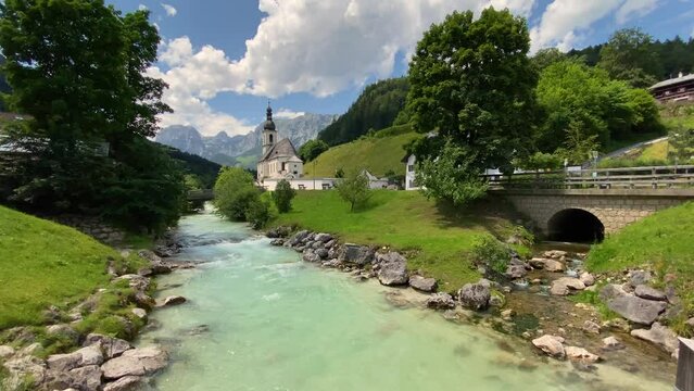 Scenic mountain landscape in the Bavarian Alps with famous Parish Church of St. Sebastian in the village of Ramsau, Nationalpark Berchtesgadener Land, Upper Bavaria, Germany