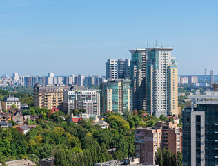 Fototapeta na wymiar Aerial view of Kiev and the elite residential complex Triumph. Ukrainian architecture