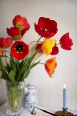 Minimal concept. Bouquet of red tulips in honor of Easter