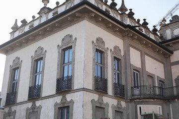 beautiful large windows in an old historical building in europe - obrazy, fototapety, plakaty