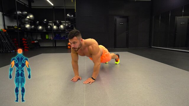 man doing push-ups and training triceps muscles in a fitness club
