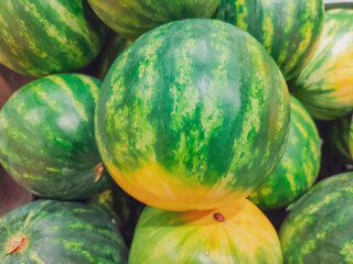 fresh red watermelon fruits at traditional market