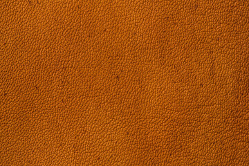 Leather orange texture closeup. Background, flat lay