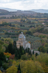 View on church, hills and vineyards from old town Montepulciano, Tuscany, Italy