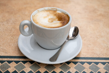 Fresh brewed coffee cappuccino in italian bar, morning coffee