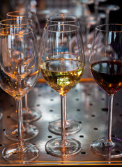 Many glasses of white and red white served for party or celebration