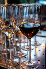Many glasses of white and red white served for party or celebration