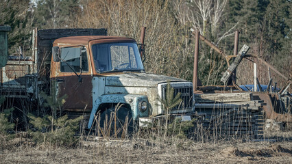 Abandoned old rusty agricultural machinery and equipment on the farm