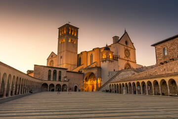 ASSISI, ITALY, 6 AUGUST 2021 Sunset over the San Francesco Basilica, one of the most important...