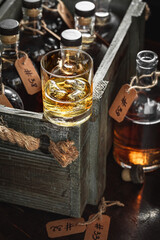 Bourbon with ice in a glass in the distillery.