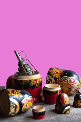 Political photo still life with a matryoshka doll and a grenade