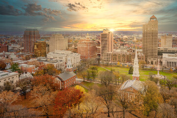 Aerial Downtown New Haven during the fall with sun rays - obrazy, fototapety, plakaty