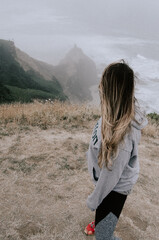 woman looking at the sea