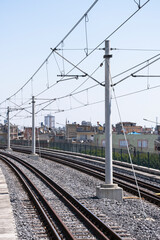 Electricity mast and energy cables of a train route. rail transportation,
