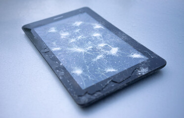 An electronic tablet with a broken touch screen. Replacing the glass on the phone. Repair of electronic equipment.