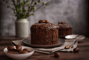 Easter cake:  traditional Russian Easter yeast pastry  Kulich - chocolate cake with raisins and...