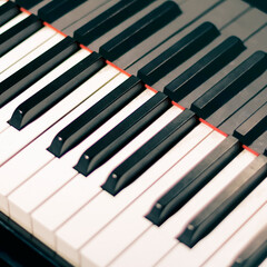 Extremely close-up of classic piano keys from above