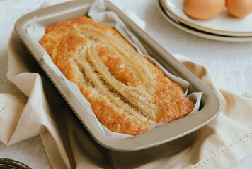 Loaf of banana bread. Trendy homemade pastry.
