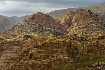 Late afternoon sunlight on the rugged landscape near the village of Villa Vil, on the road to the altiplano of Antofagasta de la Sierra, Catamarca Province, Argentina