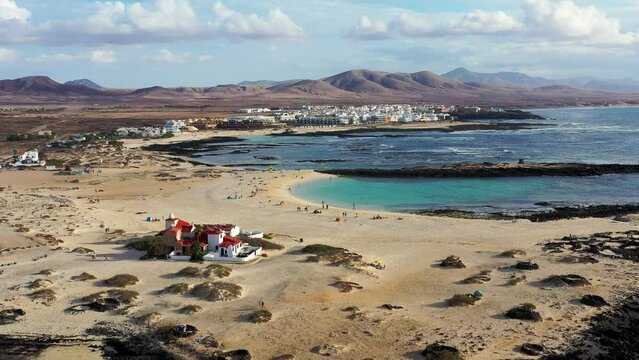 View of the beautiful Playa Chica Beach, El Cotillo, Fuerteventura, Canary Islands, Spain. White sand beach and turquoise blue water La Concha beach in El Cotillo, Fuerteventura, Canary Islands