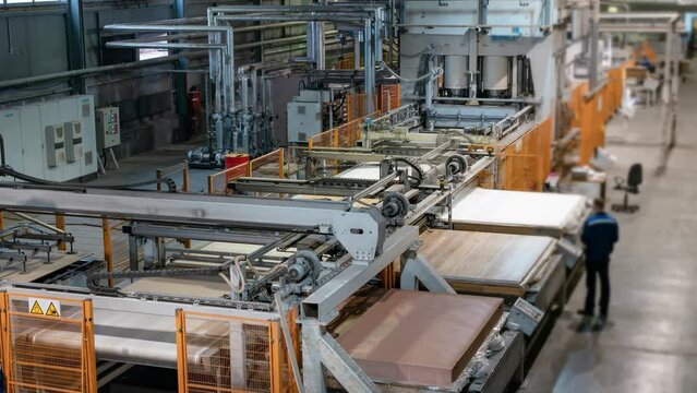 Timelapse of the production process. Manufacture of floors. The work of the production line.
