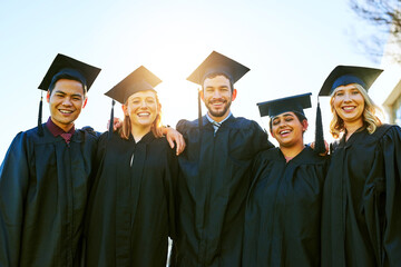 What a milestone this is for us. Portrait of a group of students on graduation day.