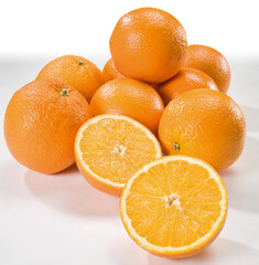 fresh orange fruits on white background