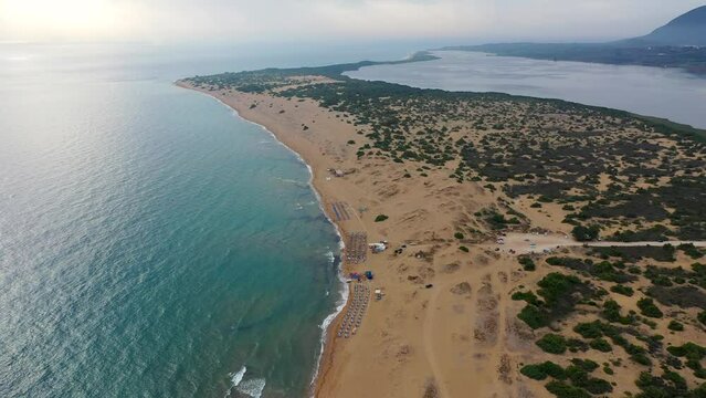 Issos beach on Corfu, near Agios Georgios, Greece. Aerial drone view of Issos beach and Lake Korission, Corfu island, Ionian Sea, Greece. Issos beach, Corfu Island.