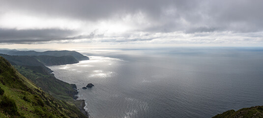 Beauty in nature with sea, sky and mountains